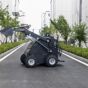 Chargeuse compacte polyvalente avec godet à changement rapide, fourche et souffleuse à neige pour travaux de construction et agricoles efficaces - Product Image 3