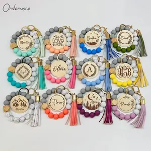 Ordermore BD65 bpa free silicone bead blanks food frade sprinting flower silicone beaded bracelet with wooden disc circle tassel
