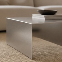 Table basse moderne en acier inoxydable en forme de U avec design décoratif, finition métal brossé, fabriquée à la main pour salon, mobilier d'hôtel