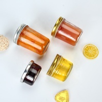 Vente en gros Bocal en verre Xuzhou 100ml 200ml 250ml 300ml 400ml Emballage en verre alimentaire pour confiture de beurre d'arachide avec couvercle en métal