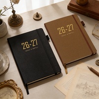 Agenda personnalisable de luxe 2027 A5 avec sangle, carnet de notes en tissu haut de gamme pour l'exportation