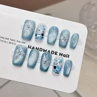 Faux ongles gothiques à presser faits à la main, couleur unie, motif papillon, courts, avec accents œil de chat