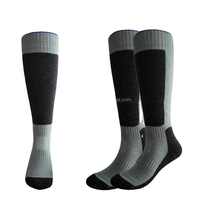 Chaussettes de ski en laine acrylique de snowboard thermique d'hiver personnalisées Chaussettes de compression 20 30mmhg Chaussettes hautes de genou à compression graduée