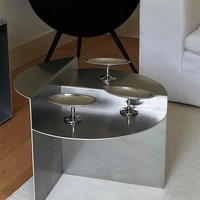 Table basse en acier inoxydable, style moderne minimaliste, forme irrégulière, meubles de salon sur mesure, usage polyvalent