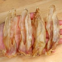 Friandises pour chats et chiens en vrac, naturelles, sèches, pour l'élimination des poils, en forme d'oreille de lapin, riches en protéines, fabriquées en usine, vente en gros, OEM