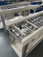 Convoyeur de transfert à levage de type à rouleaux, à alimentation croisée, à plusieurs rangées, avec lit à rouleaux à motifs, pour l'assemblage de composants à cadre large
