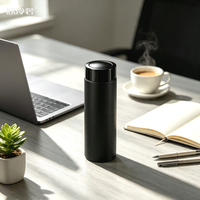 Coffret cadeau d'affaires comprenant une gourde isotherme, des écouteurs et une batterie externe, personnalisable avec logo pour les clients professionnels
