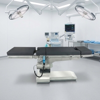 Table d'opération avec réglage électrique de l'inclinaison latérale Trendelenburg et plateau transparent aux rayons X pour salle d'opération
