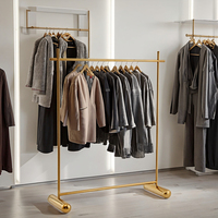 Étagère de présentation de vêtements pliable, design moderne en acier inoxydable, placage or, design élégant pour magasin de détail