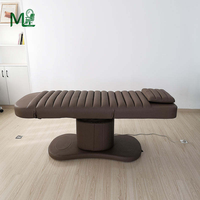 Table de massage multifonctionnelle contemporaine électrique réglable en PU pour salon de beauté et spa avec éponge haute densité