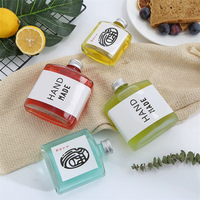 Bouteille en verre carrée plate transparente vide portable 100ml 200ml 250ml pour jus et café avec bouchon