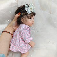 Exquis 12 pouces Silicone Reborn Baby Doll avec des cheveux courts enracinés à la main réaliste à collectionner réaliste nouveau-né jouet cadeau