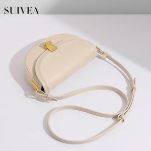 Bolso de mujer de moda francesa de nicho italiano bolso de sillín redondo cien veces hebilla de concha PUFlat crema blanco Mini bolso de hombro con textura - Product Image 5