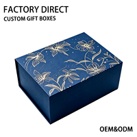 Boîte cadeau rigide en forme de livre bleu marine personnalisée, thème floral avec dorure à chaud, emballage en carton de luxe pour souvenirs
