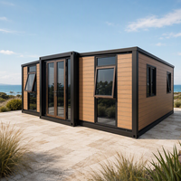 Maison conteneur pliable moderne, villa modulaire préfabriquée avec terrasse et cuisine, ignifuge et étanche pour les propriétaires
