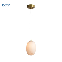 Lustre ovale minimaliste postmoderne en albâtre, lampe suspendue artistique sphérique multi-lumières pour escalier, villa, salon