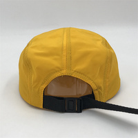 Chapeau imperméable en nylon à 5 panneaux avec écusson d'étiquette personnalisée Chapeaux en gros avec étiquette personnalisée sur le devant