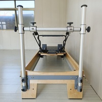 Reformer Pilates en érable avec barre de pieds coulissante pour équipement de fitness à domicile, système d'entraînement de la force du tronc