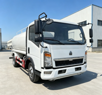 Camion-citerne à eau diesel d'occasion Sinotruk Howo de 10 000 litres en aluminium/acier au carbone, camion-citerne arroseuse 4x2 à vendre