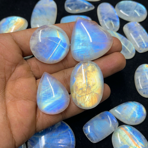Vente en gros de pierres précieuses naturelles en vrac : Pierre de lune arc-en-ciel naturelle, Cabochon ovale à taille ronde, Grande taille, Labradorite blanche pour la fabrication de bijoux - Product Image 1