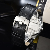 Montre à quartz classique élégante à cadran ajouré, boîtier en acier inoxydable, bracelet en caoutchouc, résistante à l'eau, aiguilles lumineuses, 33 mm – Meilleure vente