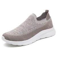 Chaussures de sport unisexes printemps-été à tige en maille tissée hautement élastique, semelle intermédiaire et extérieure en EVA, couleur unie, mode décontractée, grandes tailles