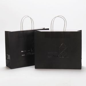 Sac en papier kraft blanc de luxe avec logo personnalisé en feuille d'argent, sacs cadeaux pour vêtements, sacs shopping en papier avec poignée torsadée - Product Image 2