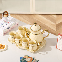 Nouvel ensemble de thé de luxe en céramique, peint à la main, doré, service à eau, théière et tasses en porcelaine pour le thé de l'après-midi, ensembles de café et de thé