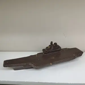 A ceramic thread incense holder with a meaning of riding the wind and breaking the waves in a warship style incense insert