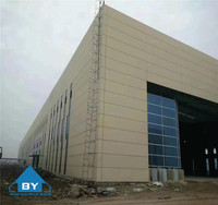 Entrepôt en structure acier imperméable sur mesure, grande portée, bâtiment industriel préfabriqué pour stockage et logistique, garantie 50 ans