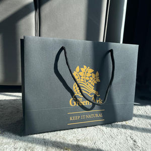 Fabricante al por mayor de lujo gris textura arte papel <span class=keywords><strong>Gif</strong></span> bolsa de compras brillante oro hoja logotipo cuerda trenzada mango mate laminación - Product Image 3