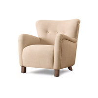 Fauteuil individuel haut de gamme pour salon, avec accoudoirs effilés, revêtement en tissu, pieds en chêne massif, idéal pour appartement et villa