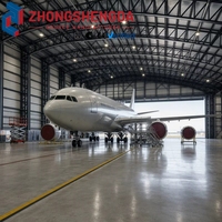 Hangar d'avion en structure métallique à grande portée avec toit en treillis arqué, portes géantes à haut débitement, bâtiment aéronautique préfabriqué CE