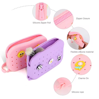 Petit porte-monnaie ovale en silicone à la mode nouveau sac cosmétique décoratif bricolage avec fermeture à glissière et trou décoratif
