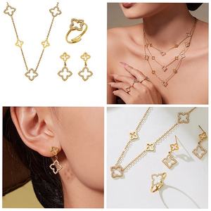 Chaînes en acier inoxydable plaqué or PVD 18K avec pendentif trèfle ajouré et fleur pavée de zircone cubique, bijoux porte-bonheur tendance, vente en gros - Product Image 5