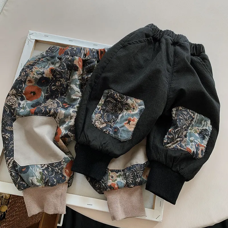 Pantalones de felpa de edición coreana de gran venta de invierno 2024 nuevos pantalones holgados y cálidos de moda gruesos para niños y niñas