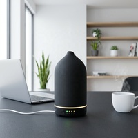 Diffuseur d'arômes ultrasonique en céramique noir mat de haute qualité unique avec 7 types d'LED pour une utilisation domestique