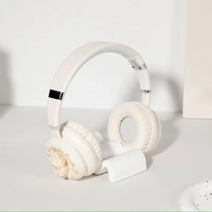 Must - See pour les fans de gentillesse! Oreillette Bluetooth de style beignet en peluche Labubu, commencez un voyage d'écoute adorable - Product Image 1