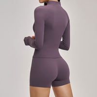 Veste de yoga unie pour femme en Spandex/Nylon brossé, anti-transpiration, à manches longues, avec poche zippée, coupe ajustée, pour l'extérieur
