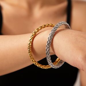 Bracelet manchette ouvert femme design simple X Bracelet fil de câble torsadé pour femme - Product Image 1