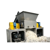 Déchiqueteuse industrielle à double ou simple axe pour sacs FIBC en film PP/PE, avec PLC automatique, robuste, pour la réduction de taille et le recyclage