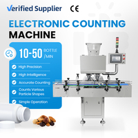 Machine de comptage et de remplissage automatique de comprimés et de pilules à haute précision, avec bouchonnage