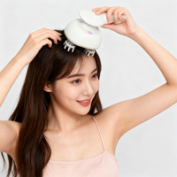 Masseur électrique portable à main avec tête vibrante pour la relaxation du cuir chevelu, apaisement du cuir chevelu et nutrition ciblée des cheveux