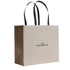 Bolsas de papel de precio holesale con su propio logotipo, embalaje impreso personalizado blanco, bolsa de papel grueso rosa para regalo
