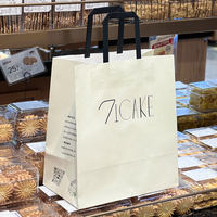 2025 sacs alimentaires en papier kraft blanc écologique de luxe personnalisables avec logo de magasinage de café recyclables
