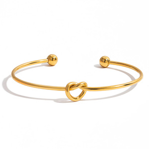 Bracelet à manchette tendance, design nœud papillon doré, bijoux unisexes, cadeau - Product Image 5