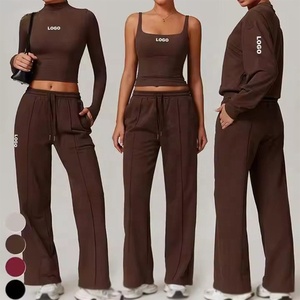 XIANDA Completo Sportivo da Donna 2 Pezzi: Top Corto Compressivo e Pantaloni Larghi per Yoga, Fitness e Palestra - Product Image 1