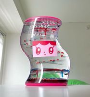 Nouvelle bouteille apaisante et relaxante en forme de S à mouvement liquide pour le soulagement de l'anxiété, idéale pour les besoins sensoriels spéciaux et la décoration de la maison ou du bureau