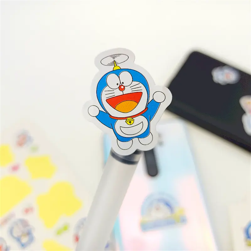 लोकप्रिय जापानी एनीमेशन सजावटी स्टीकर Doraemon कार्टून सजावट स्टिकर मोबाइल फोन हैंडसेट के लिए सेलफोन सामान