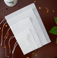 Sac d'emballage de filtre à thé parfumé vide en coton, non-tissé personnalisé en fibre de maïs jetable à base de plantes médicinales avec cordon de tirage